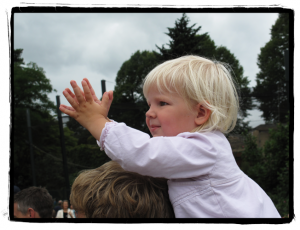 Ella clapping the parrot