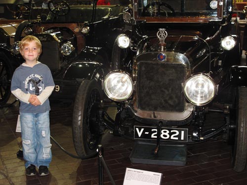 Toby with his favourite car - because it is smiling. "It's just a really happy car, Mummy."