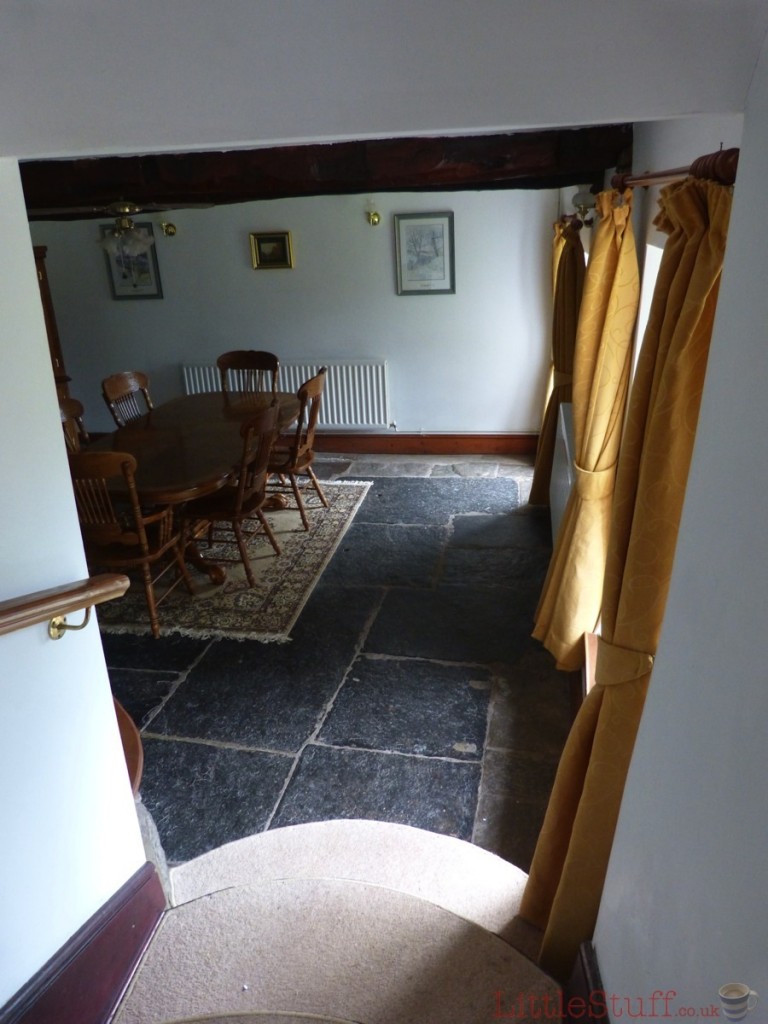 Looking down the steps from the hall into the dining room