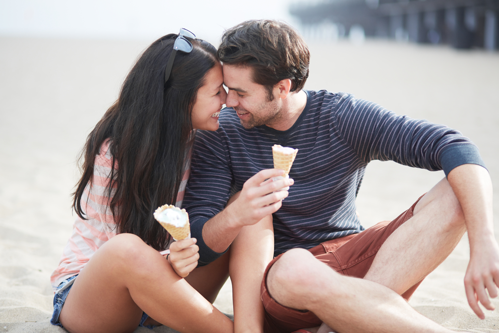 Couple flirting over ice cream - Image courtesy of Shutterstock