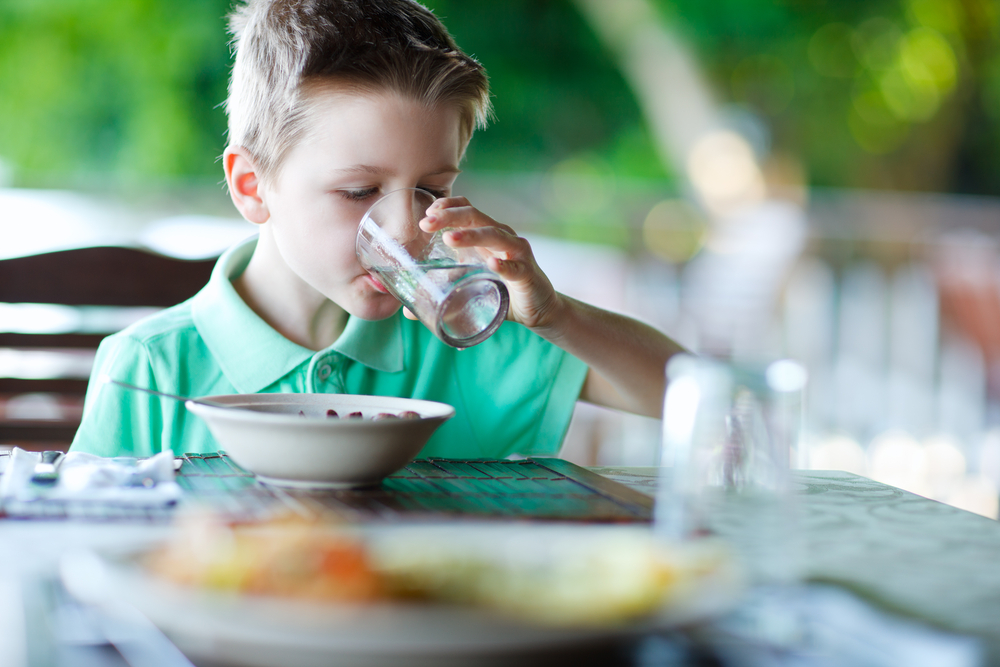 boy drinking water - image courtesy of Shutterstock